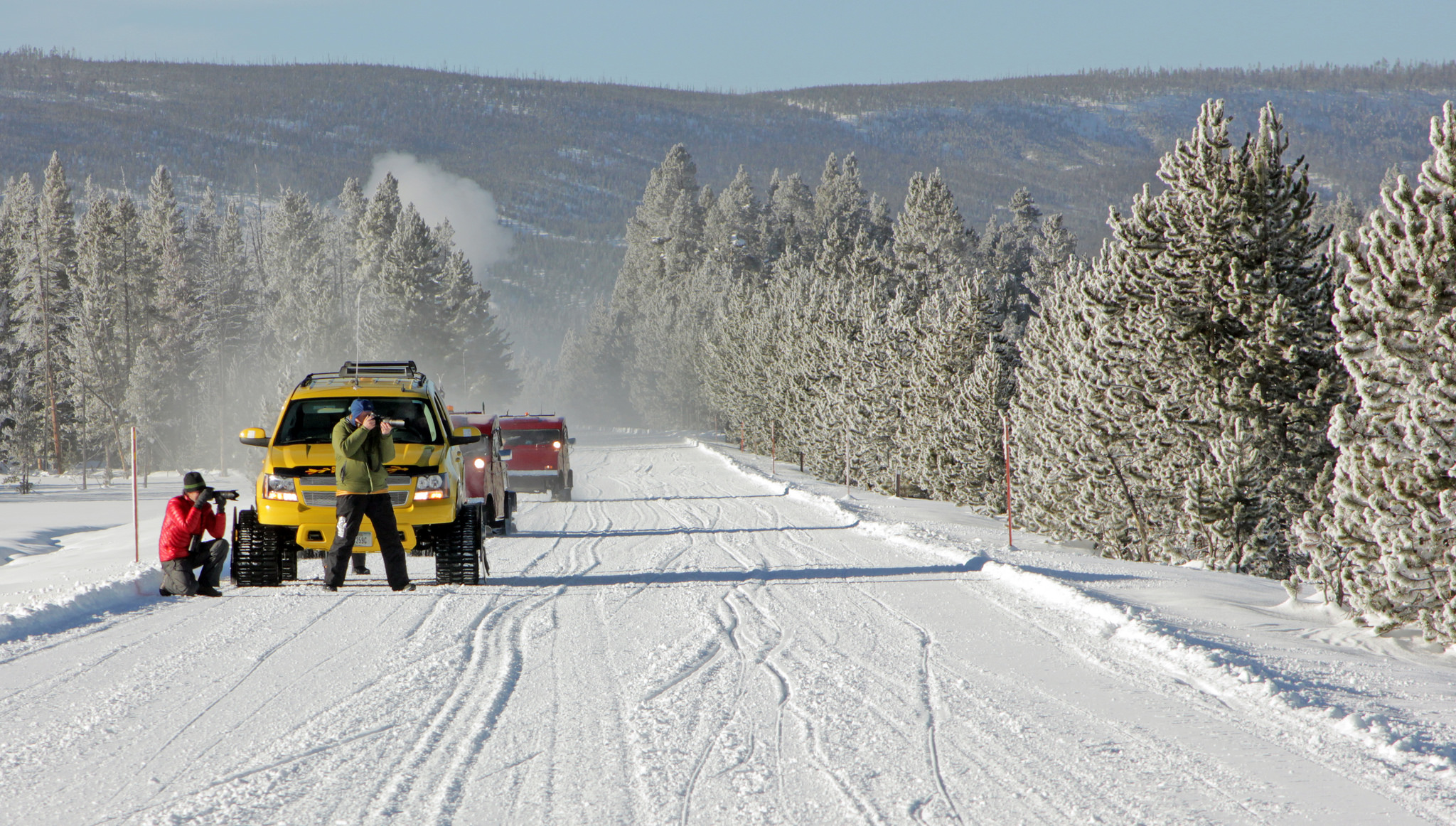 Experiencing Yellowstone by Snowcoach is the ideal way to see this timeless national park in winter ... photo by CC user yellowstonenps on Flickr